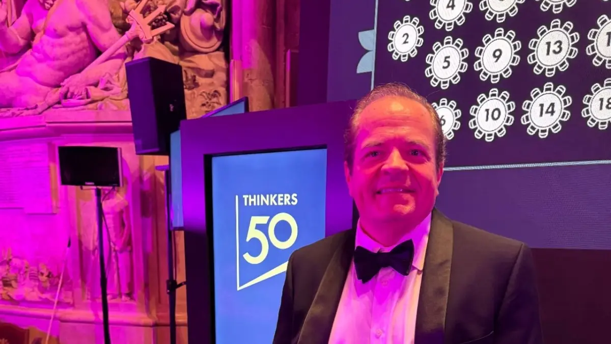 Ken Gavranovic before the Thinkers50 sign at the awards gala in London