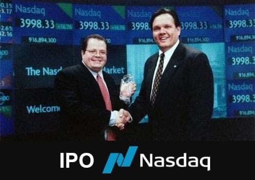 Ken Gavranovic at the Nasdaq market site on IPO day, a handshake and the Nasdaq award in front of the market screens